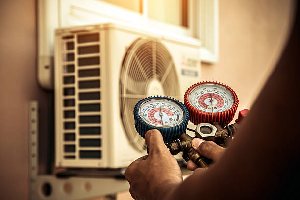Professional Ac Installation technician working in West Groton, MA